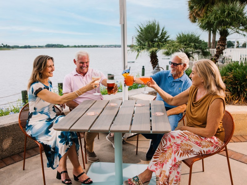 WFI Calypso Group Patio Cheers Waterview May2025