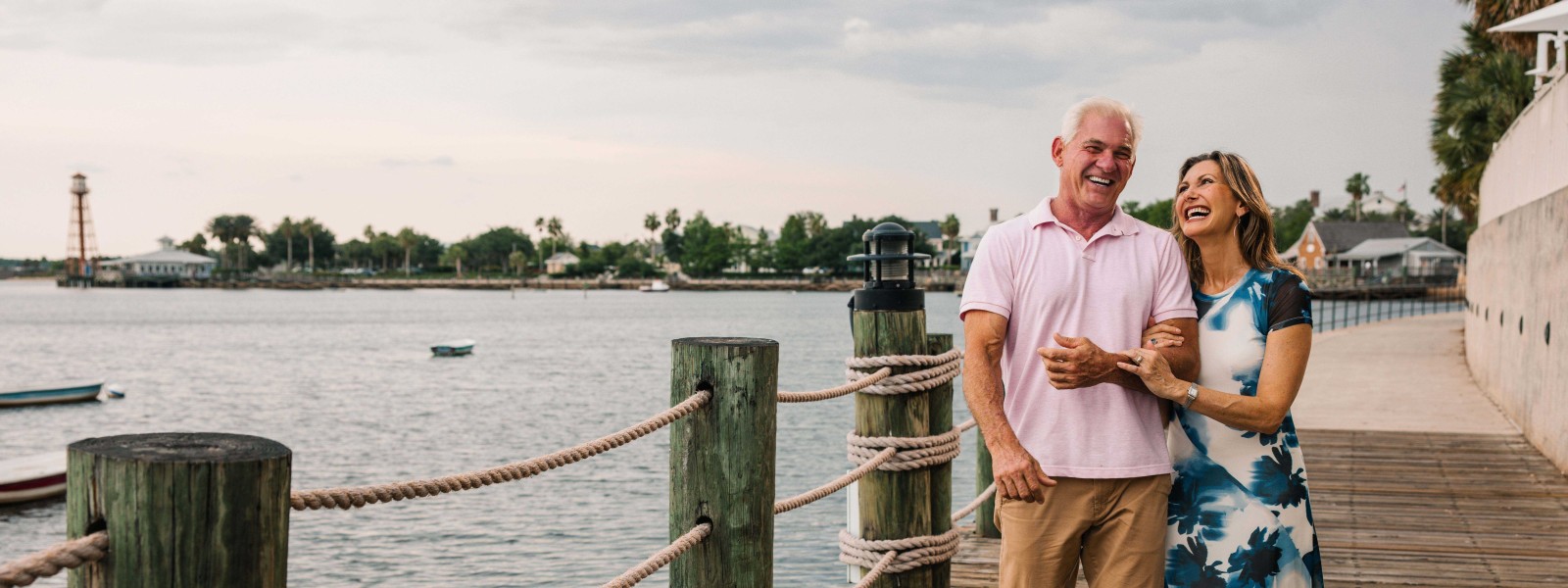 Couple walking the Boardwalk at The Waterfront Inn